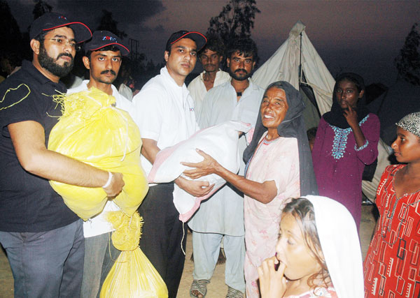 Zong relief goods Zong Distributes Goods in Flood Hit Areas