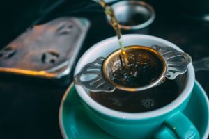 Using a filter to pour coffee
