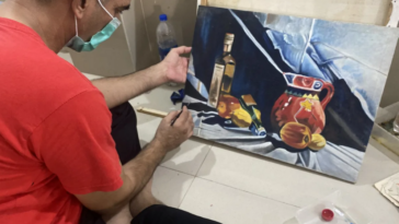 prisoner painting in school of fine arts and music