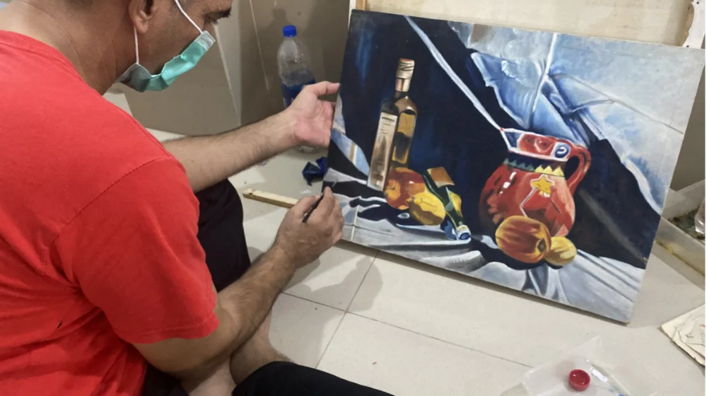 prisoner painting in school of fine arts and music