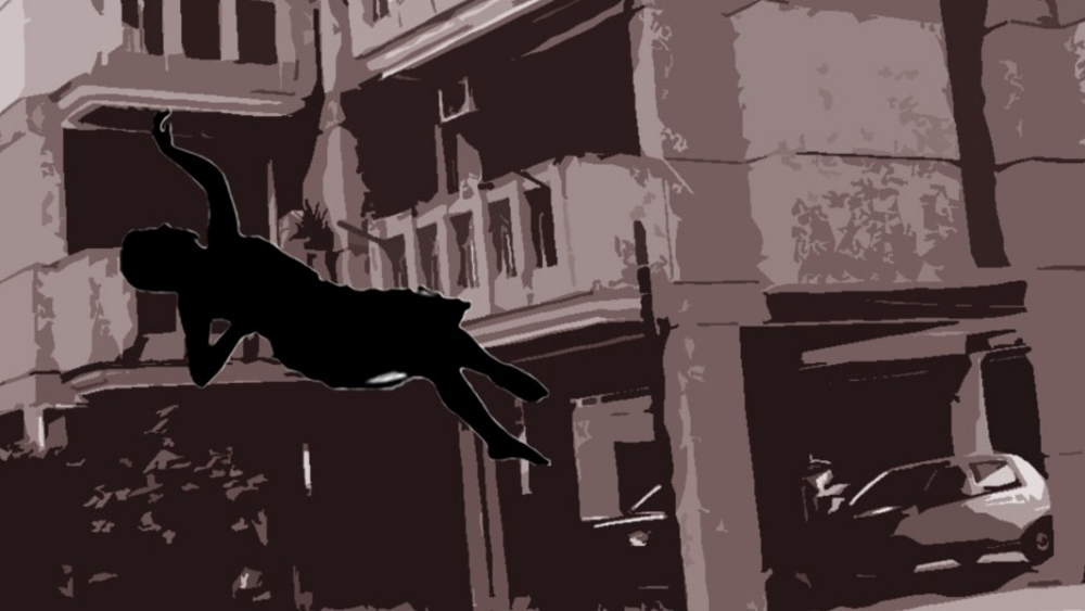 Karachi woman jumps off building