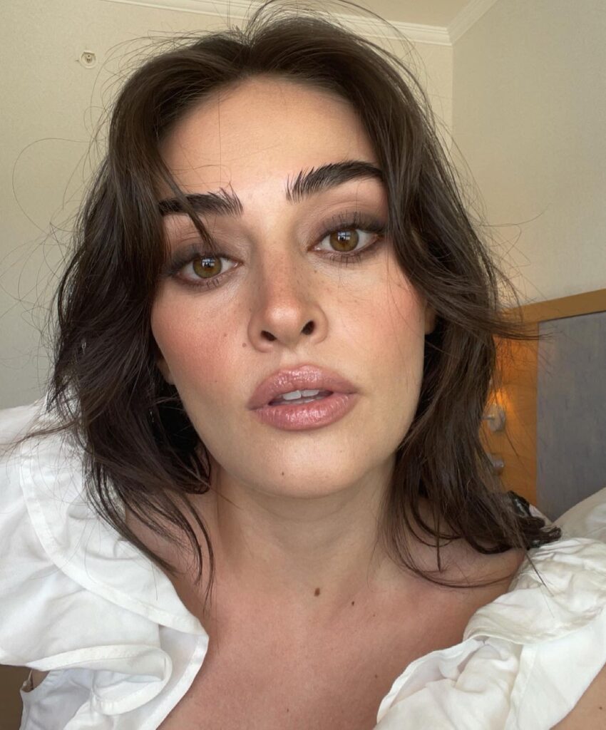 Esra Bilgiç Looks Fierce in a White Ruffled Top and Smokey Eyes - Lens