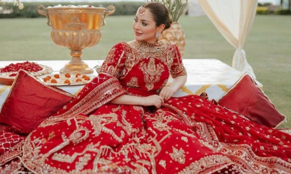 Hania Amir Looks Regal In A Red Bridal ...