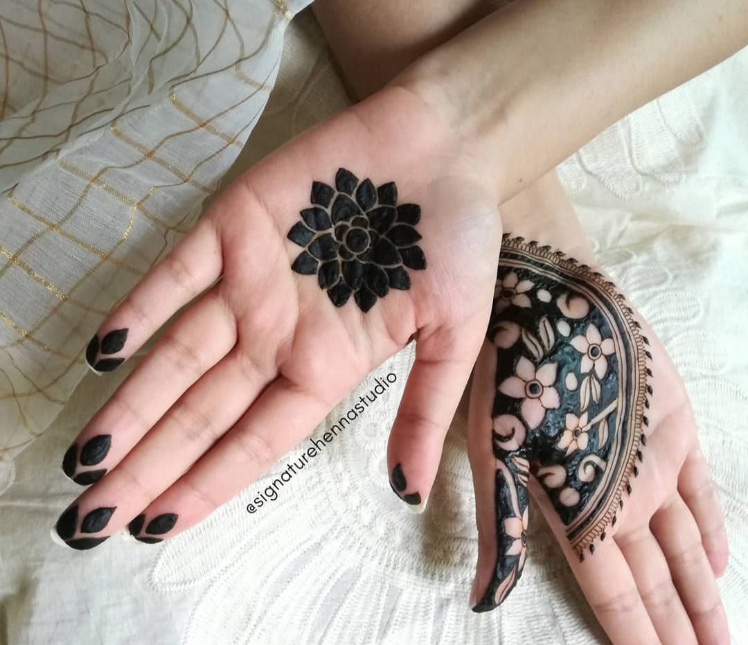 Person with mehndi fingers tattoo photo  Free Grey Image on Unsplash
