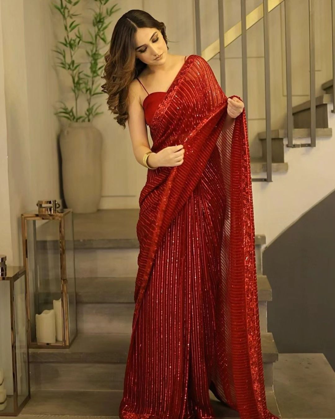 Aiza Awan Dazzles in a Sparkly Red Saree with Deep-Neck Blouse - Lens