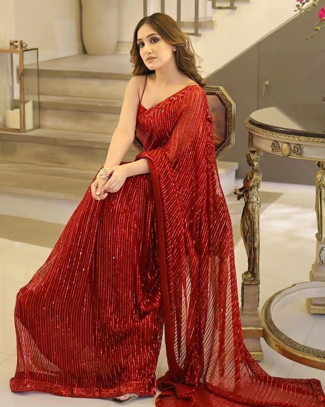Aiza Awan Dazzles in a Sparkly Red Saree with Deep-Neck Blouse - Lens