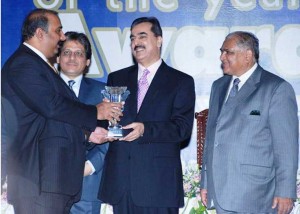 Prime Minister Syed Yousaf Raza Gilani presenting Brand of Year  Award 2008 for the Best Cellular Company in Pakistan to Warid’s Acting Chief Executive Office – Faisal Ejaz Khan