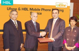 Ufone and HBL signed an agreement for Mobile Commerce Solution. Picture shows Mr. Abdul Aziz, President & CEO Ufone and Mr. Zakir Mahmood, President & CEO HBL, exchanging documents at the ceremony