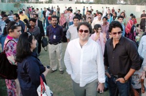 Bilal Munir Sheikh, Vice President Marketing Mobilink standing next to Mobilink Brand Ambassador Wasim Akram amongst employees families at the Mobilink Foundation Fundraising Carnival organized at the Gun Club Islamabad
