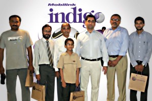 At the Mobilink indigo World Cup Campaign Prize Distribution Ceremony held in Karachi, four lucky BlackBerry Storm handset winners standing with Regional Director Sales Mobilink, Abdul Muqeet Farid and Regional Director Customer Care Operations Mobilink.