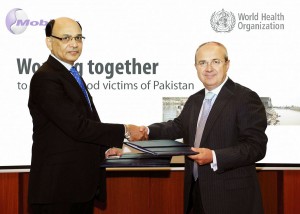 President and CEO Mobilink Rashid Khan with Dr. Guido Sabatinelli World Health Organization Representative in Pakistan exchange MoUs to install the prefabricates as basic health units in the flood affected districts of Pakistan.