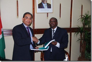 GM Business Development Secure Tech Consultancy, Mr. Mohammad Javed and Permanent Secretary MIRP Kenya, Mr. Emmanuel M. Kisombe exchanging documents after signing the contract for IPRS Project