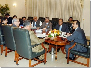 Prime MInister Yousaf Raza Gilani chairing a meeting on 3G licence and Grey Traffic at the PM house on Wednesday. PHOTO: PID