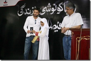 7 Competition Winner of Schools receiving prizes by Shahid Khan Afradi