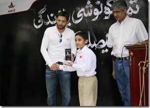 8 Competition Winner of Schools receiving prizes by Shahid Khan Afradi