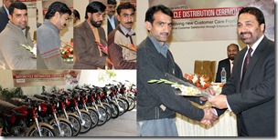 Syed Mazhar Hussain, PTCL Senior Executive Vice President (SEVP), Human Resources, presenting motorcycle keys to PTCL customer care staff