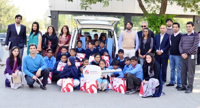 Mobilink Hands over Mobile Library to JAQ Trust Students