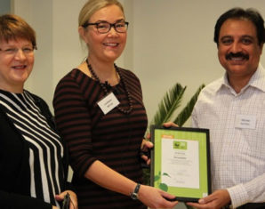CEO WWF Finland - Liisa Rohweder - presenting the BEST COORDINATOR Diploma to Wajid Hussain Junejo at a ceremony held in Helsinki Finland