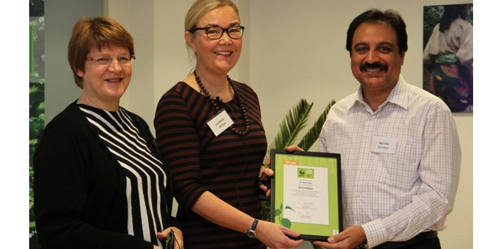CEO WWF Finland - Liisa Rohweder - presenting the BEST COORDINATOR Diploma to Wajid Hussain Junejo at a ceremony held in Helsinki Finland