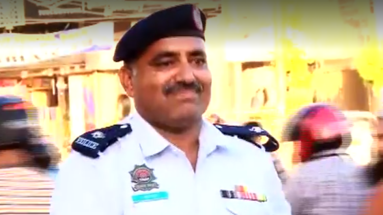 This Traffic Warden from Karachi is Winning the Internet with His Smiles
