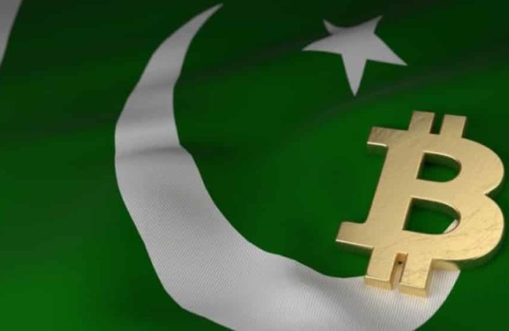 bitcoin logo on pakistani flag