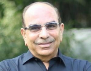 malik riaz smiling