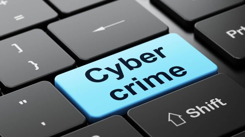 cybercrime on keyboard enter button