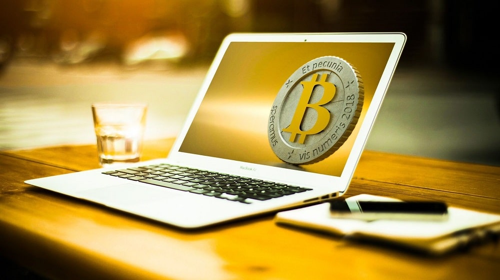 Bitcoin Macbook White on Table