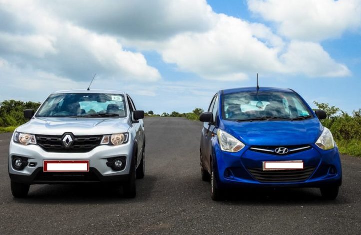 Silver Renault and Blue Hyundai