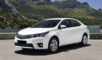 white toyota corolla