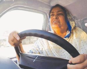 Asia Bibi driving minivan faislabad