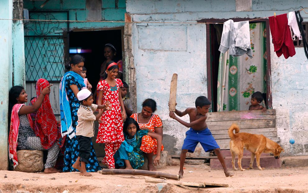 boy playing cricket in Colombo