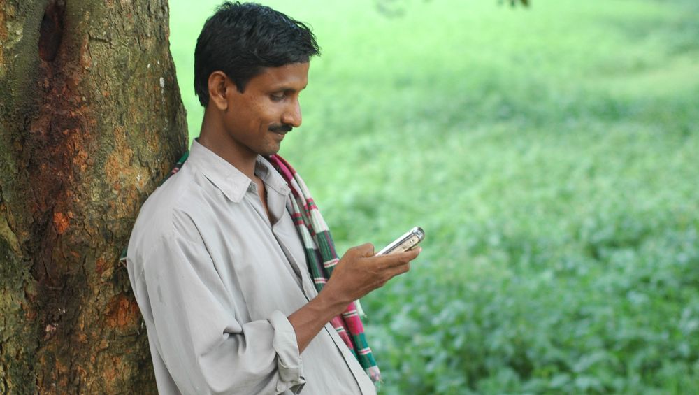 farmer using mobile phone