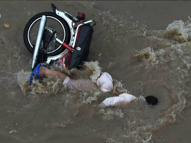 man bike drowned in lahore road after rain