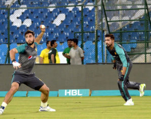 Pakistani cricket players practising