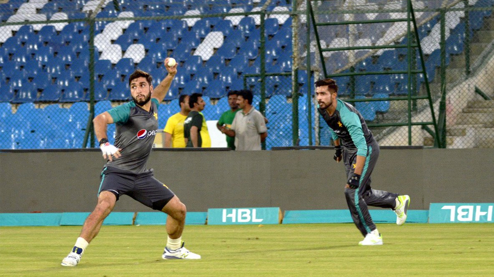 Pakistani cricket players practising