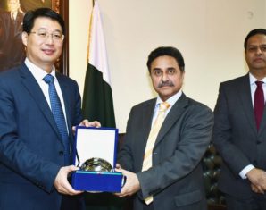 Counseller Chinese Embassy handing over equipment to Dr Jawwad Owais Agha Member Customs (Operations)