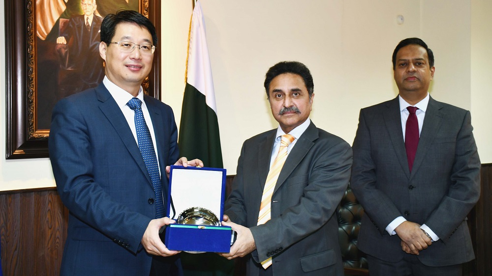 Counseller Chinese Embassy handing over equipment to Dr Jawwad Owais Agha Member Customs (Operations)