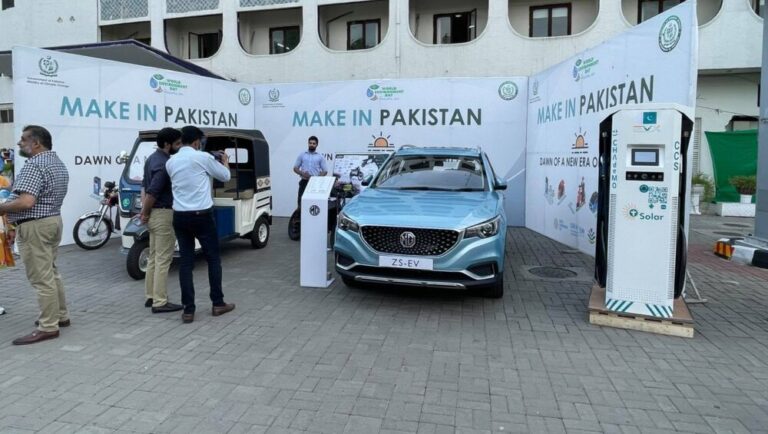 tesla industries shows off its ultra fast ev charger to shah mehmood qureshi