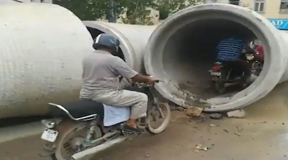 Genius Pakistanis Convert Sewage Pipe Into an Underpass [Video]