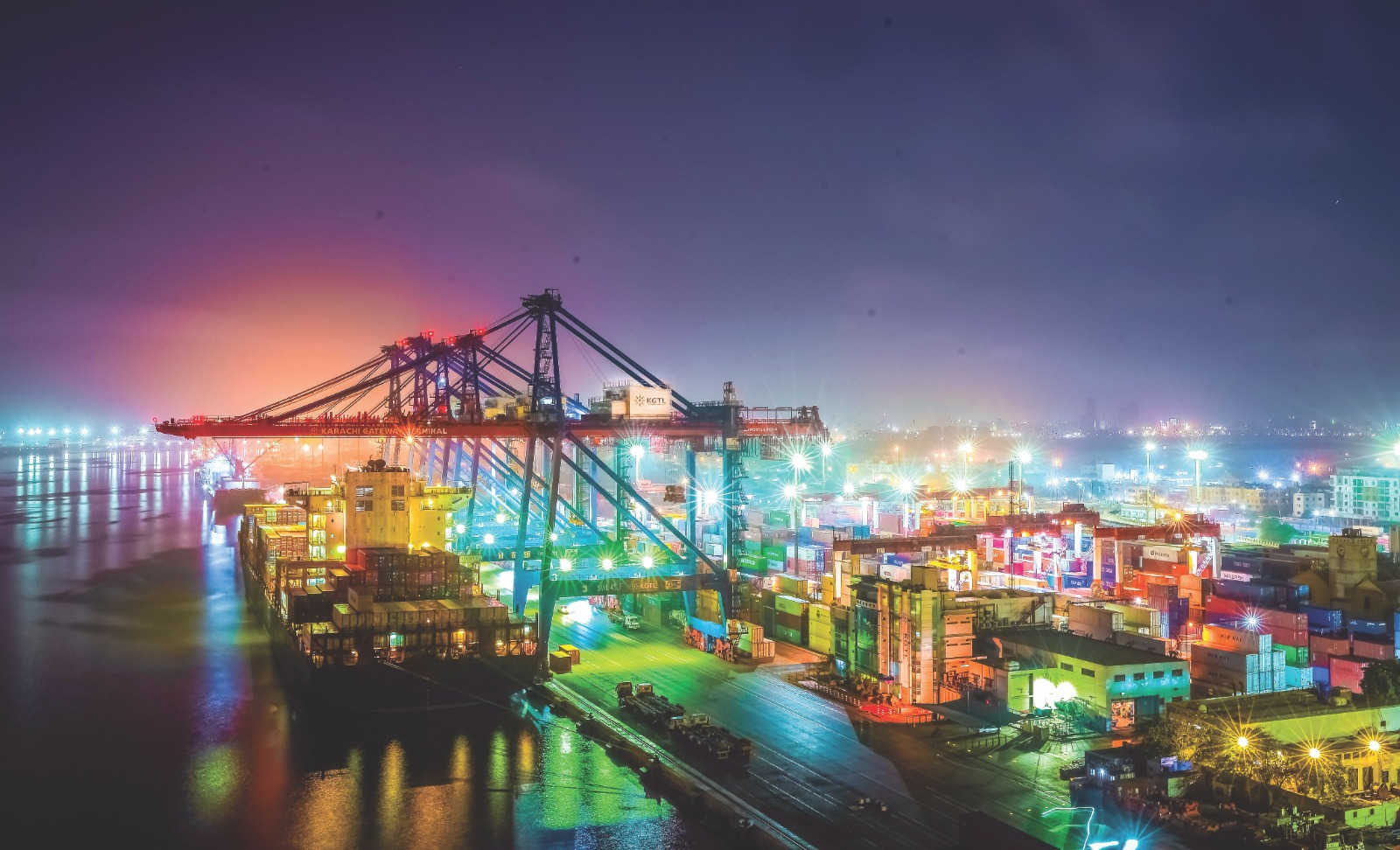 Aerial view at night of Karachi Gateway Terminal on the East Wharf of Karachi Port.