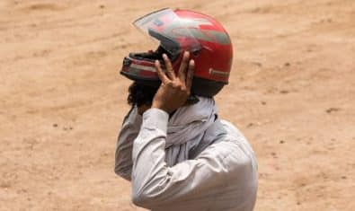 motorcyclists riding without helmets