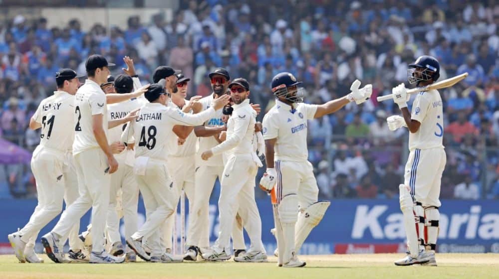 New Zealand celebrating Sweeping India