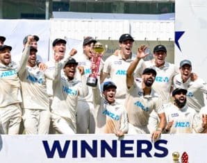New Zealand with the winners trophy over India