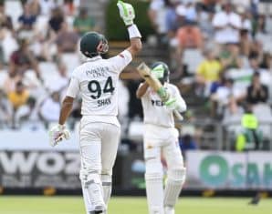 Shan Masood and Babar Azam celebrate their stand