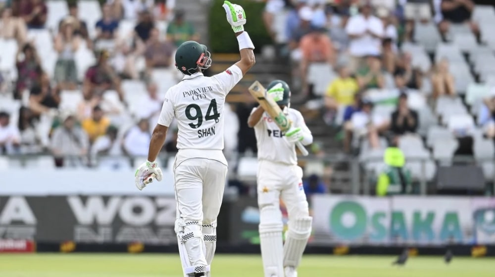 Shan Masood and Babar Azam celebrate their stand