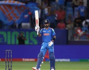 Virat Kohli celebrates his fifty