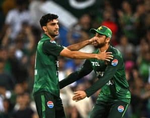 Sufiyan Muqeem during an international match with Salman Ali Agha