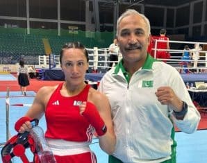 Laura Akram with her coach