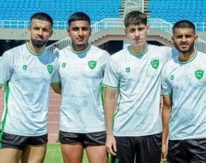 Rayan Mohammed with his teammates